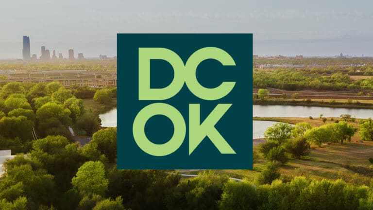 The Del City logo over a photograph of the municipal area.