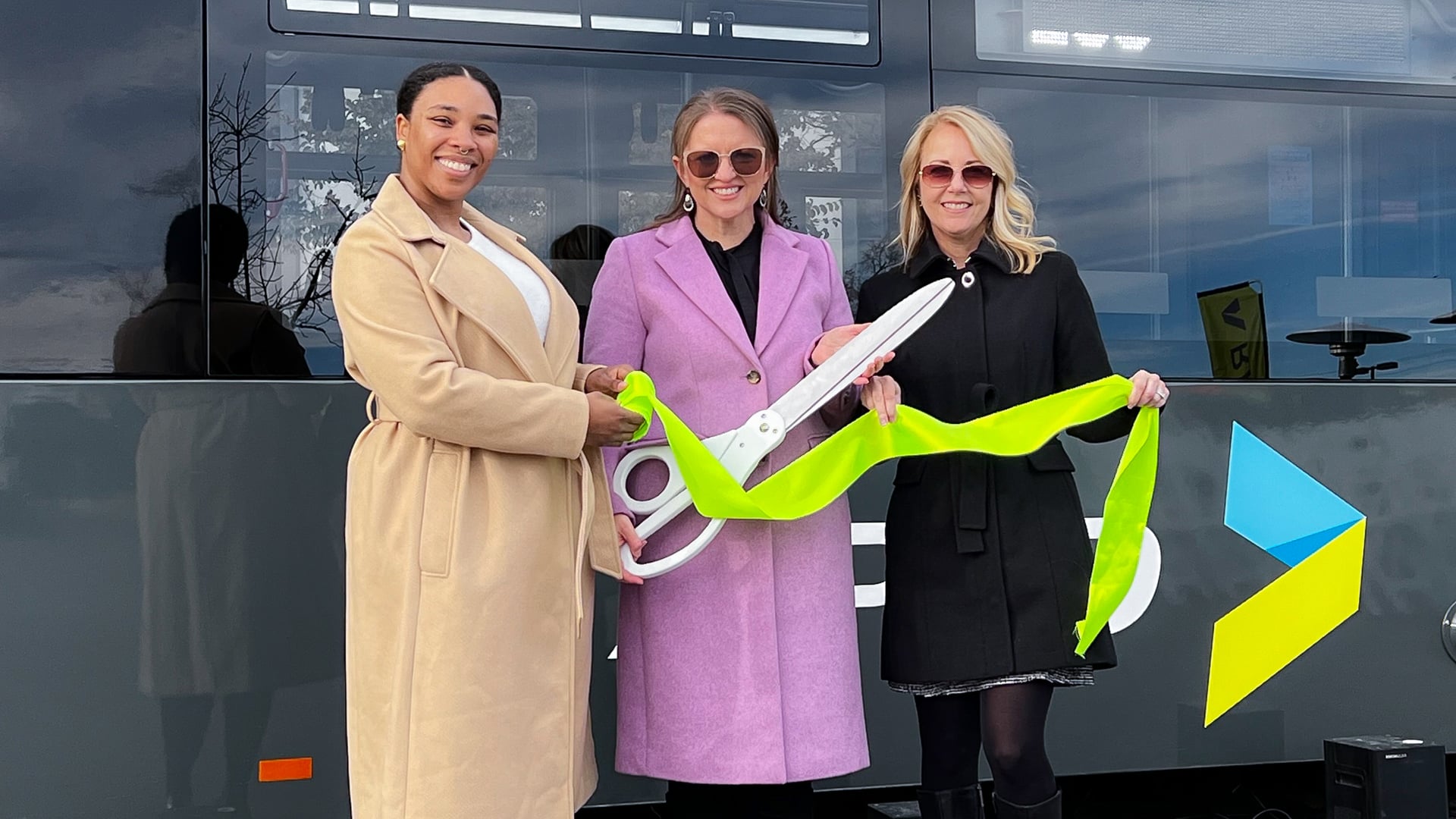 The Koch Comm team at the ribbon cutting for the EMBARK RAPID bus line launch.