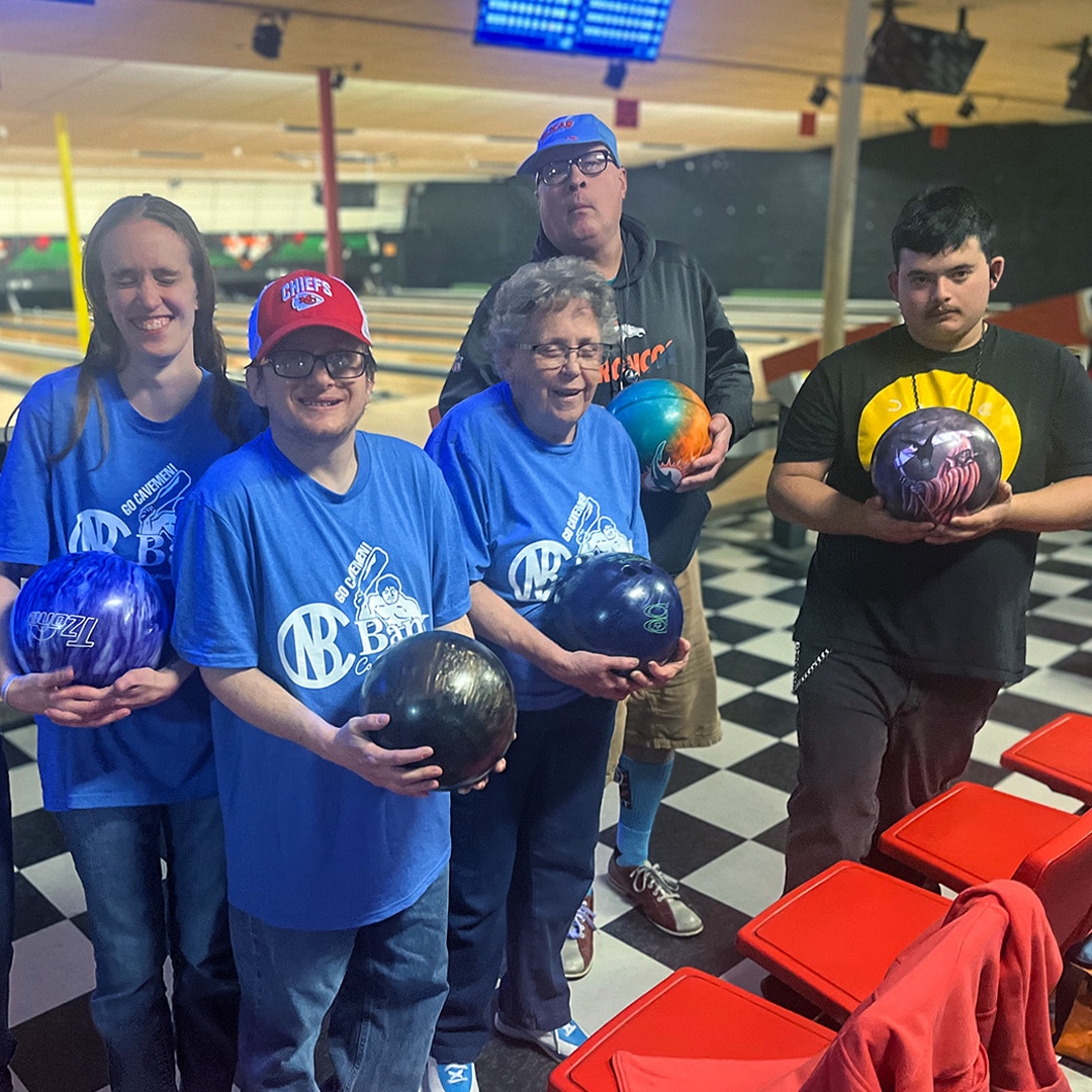 A group of CARC residents having fun at a bowling alley.