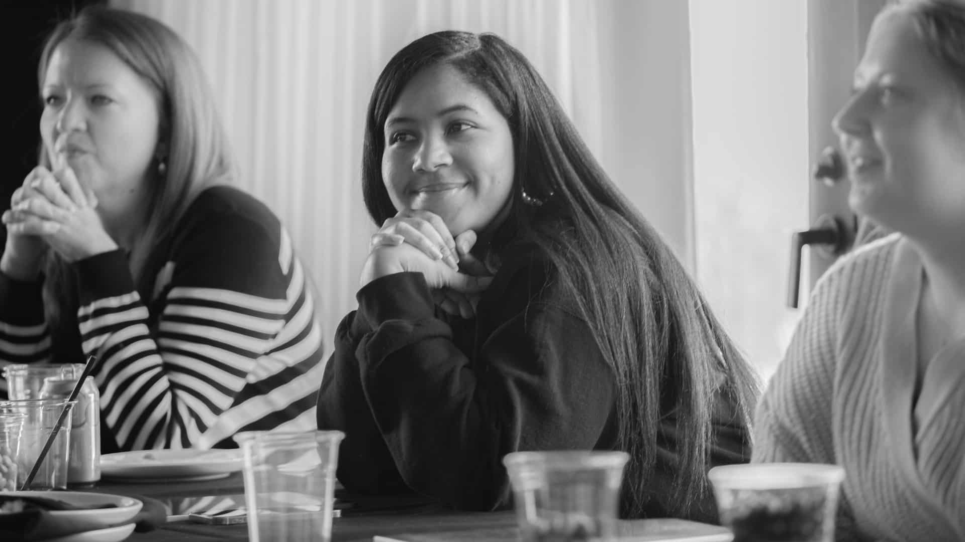 A Koch Comm copywriter smiling and engaging during a staff retreat.